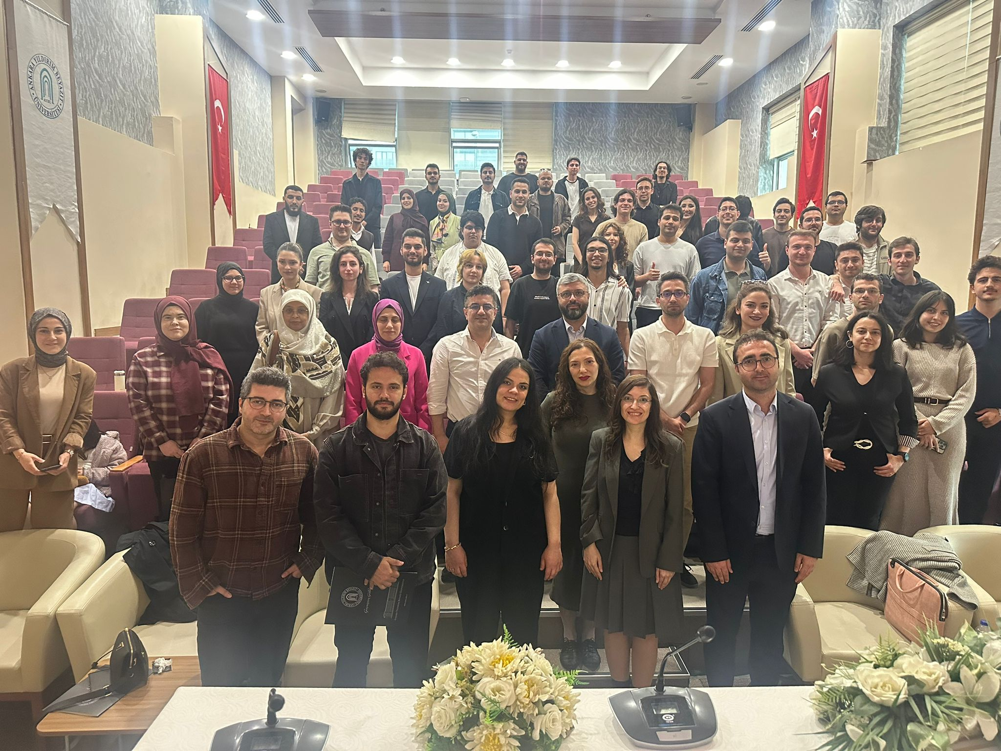 Students, faculty members, and guests gathered for a commemorative group photo following the AYBU Software Engineering 2026 Graduation Projects Exhibition.
