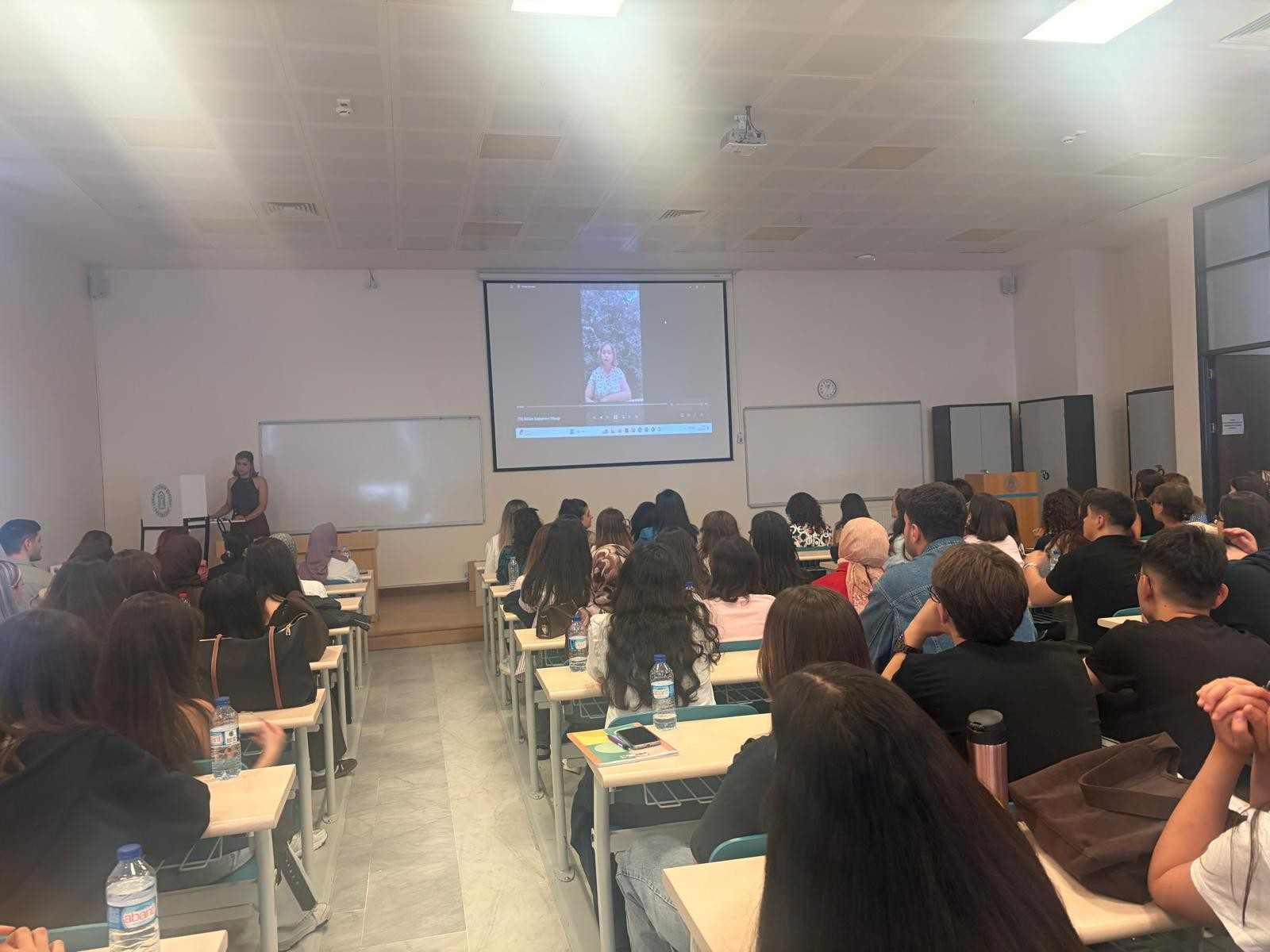 The department head’s message is being passed on to the students.