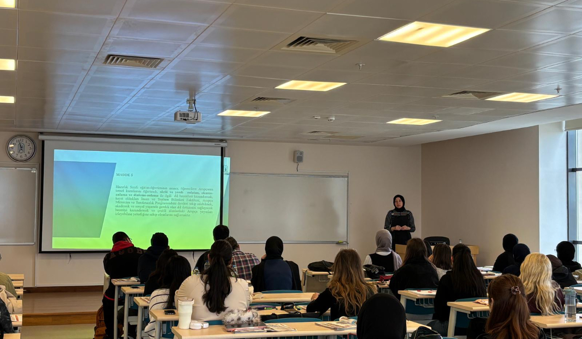 A photo of our faculty member delivering a speech.