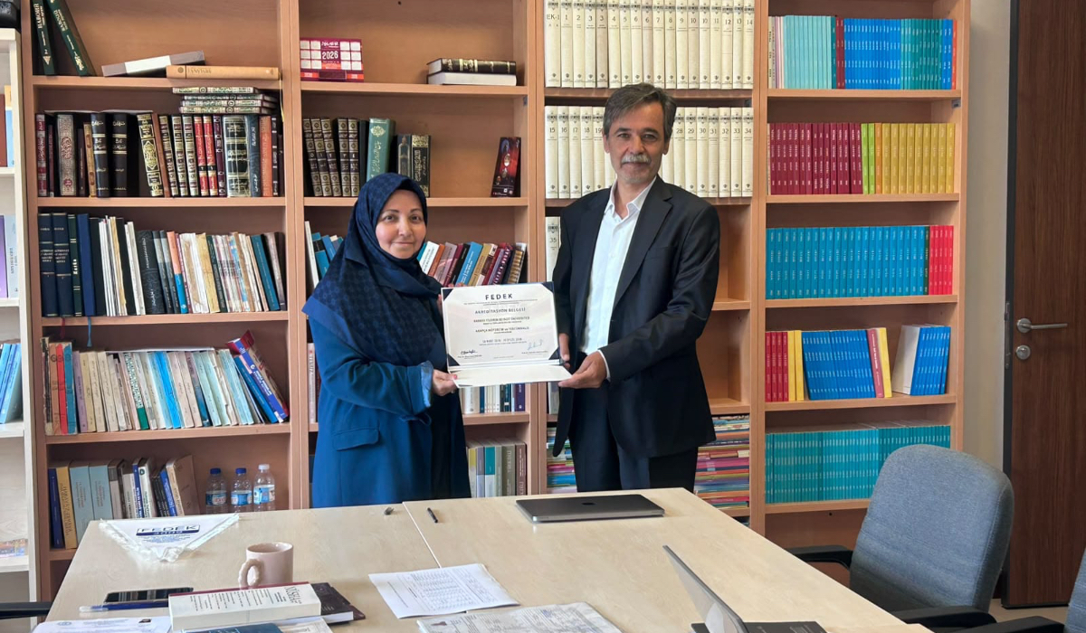 Our Vice Dean is presenting the certificate to our Head of Department.