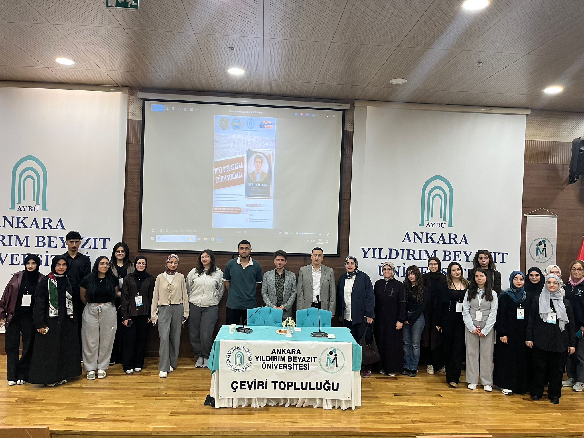Group photos of our students at the podium after the program.